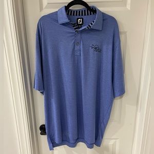 Footjoy XL blue polo shirt. Divi Aruba logo on left chest. Excellent condition